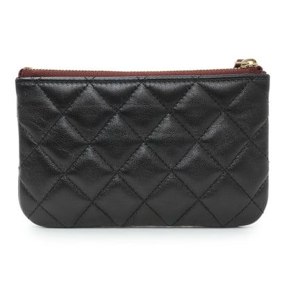 Exclusive Chanel Black Lambskin Quilted Small Cosmetic Case — Side View