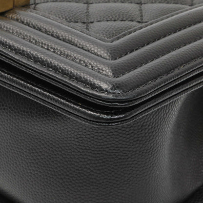 Exclusive Chanel Black Caviar Quilted Small Boy Flap — Lifestyle View
