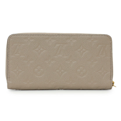 Exclusive Louis Vuitton Tourterelle Monogram Empreinte Zippy Wallet — Side View