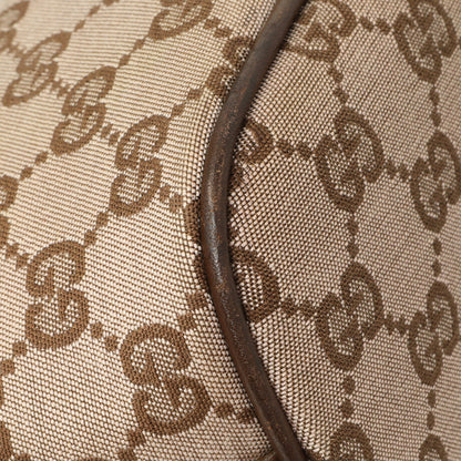 Exclusive Gucci Monogram Canvas Boat Pochette — Top View
