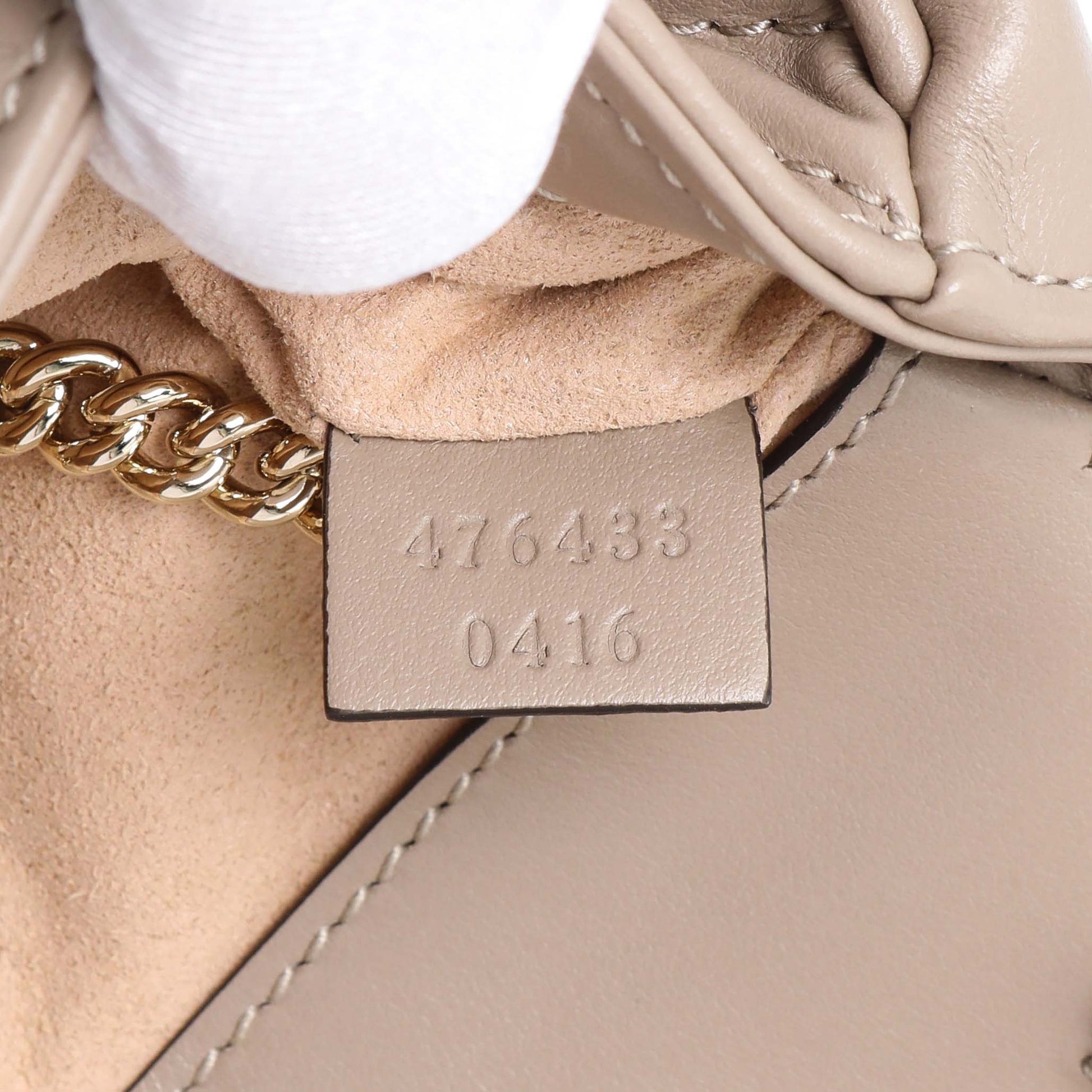 Exclusive Gucci Beige Calfskin Matelasse Super Mini GG Marmont Shoulder Bag — Lifestyle View