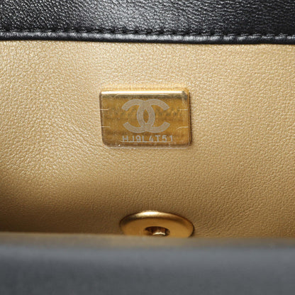 Exclusive Chanel Black Lambskin Quilted Mini Rectangular Pearl Crush Flap — Lifestyle View