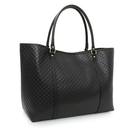 Exclusive Gucci Black Microguccissima Large Joy Tote — Side View