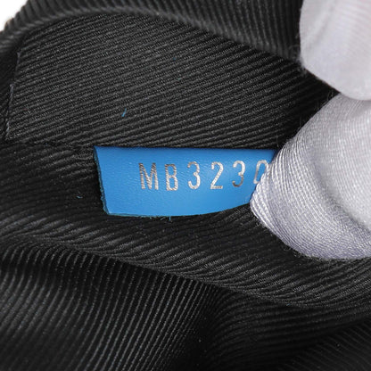 Exclusive Louis Vuitton Damier Graphite Giant Avenue Sling Backpack — Lifestyle View