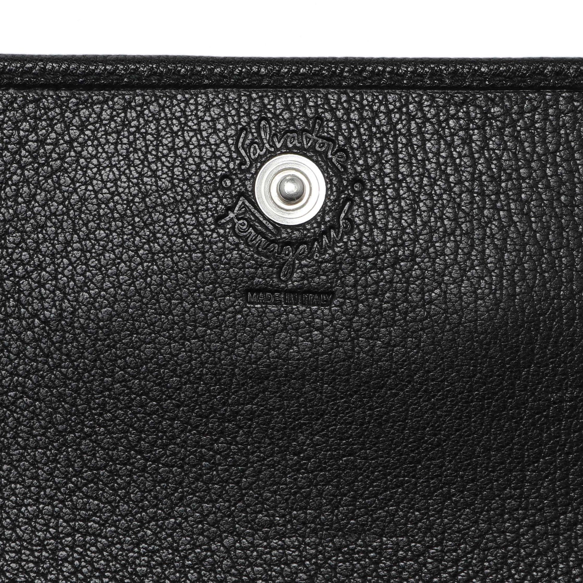 Exclusive Salvatore Ferragamo Black Calfskin Vara Bow Wallet — Lifestyle View