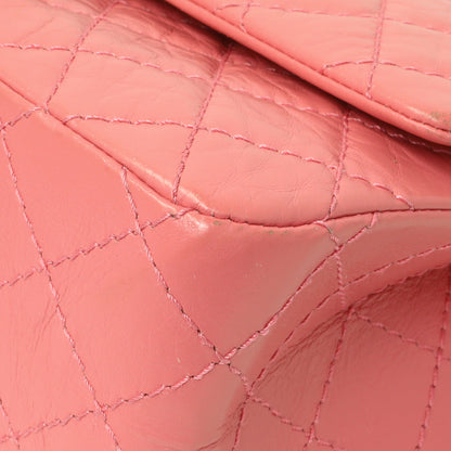 Exclusive Chanel Pink Quilted Aged Calfskin Reissue 225 Flap — Detail View