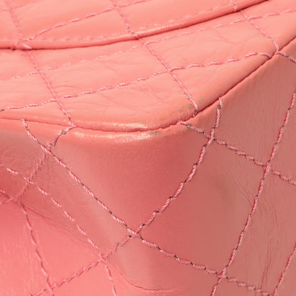 Exclusive Chanel Pink Quilted Aged Calfskin Reissue 225 Flap — Lifestyle View