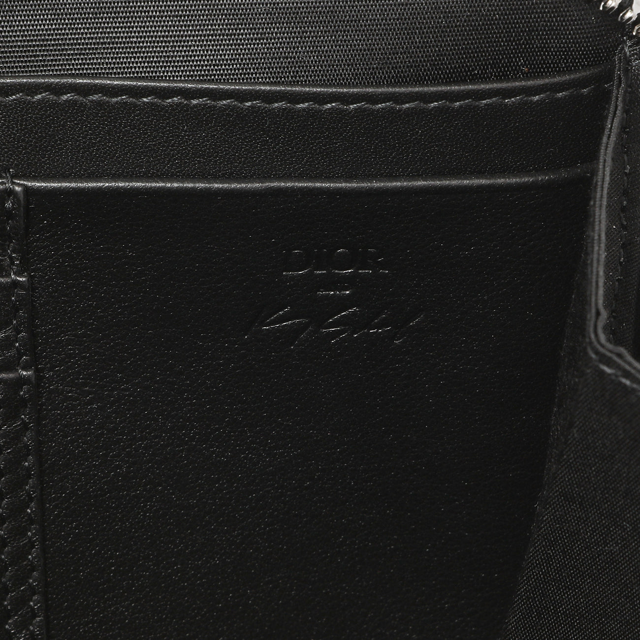 Exclusive Christian Dior X Kenny Scharf Oblique Embroidered Patches Double Zip Crossbody Pouch — Lifestyle View