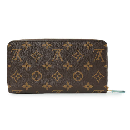 Exclusive Louis Vuitton Monogram Zippy Wallet — Side View