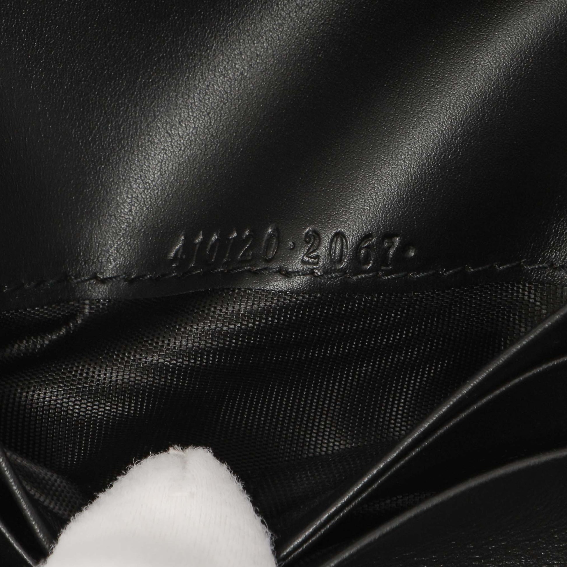 Exclusive Gucci Black Guccissima Card Case Wallet — Lifestyle View