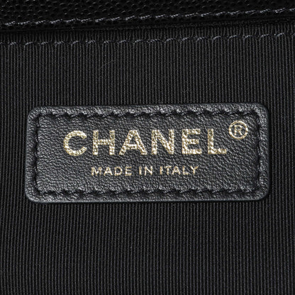 Exclusive Chanel Black Caviar New Medium Boy Flap — Lifestyle View
