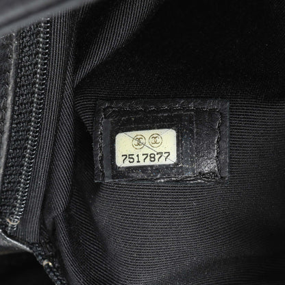 Exclusive Chanel Black Quilted Caviar Medallion Tote — Lifestyle View