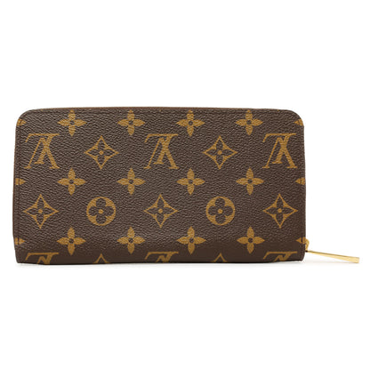 Exclusive Louis Vuitton Monogram Fuchsia Zippy Wallet — Side View