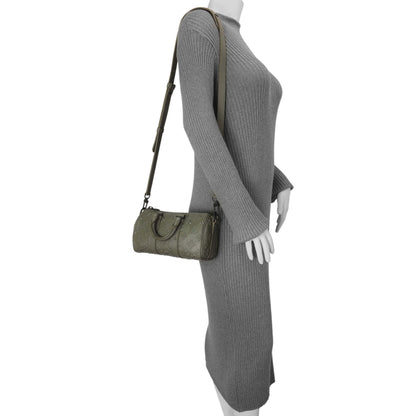 Exclusive Louis Vuitton Khaki Monogram Seal Keepall XS — Lifestyle View