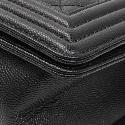 Exclusive Chanel Black Quilted Caviar Medium Boy Flap — Lifestyle View