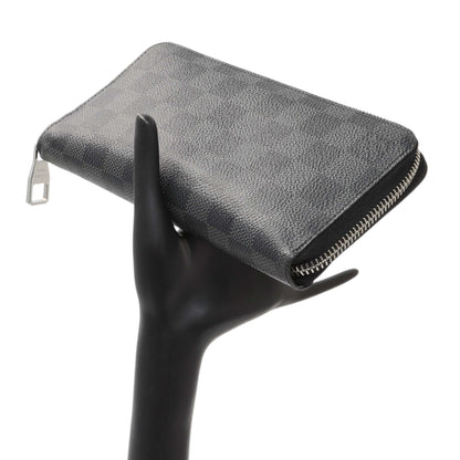 Exclusive Louis Vuitton Damier Graphite Vertical Zippy Wallet — Lifestyle View