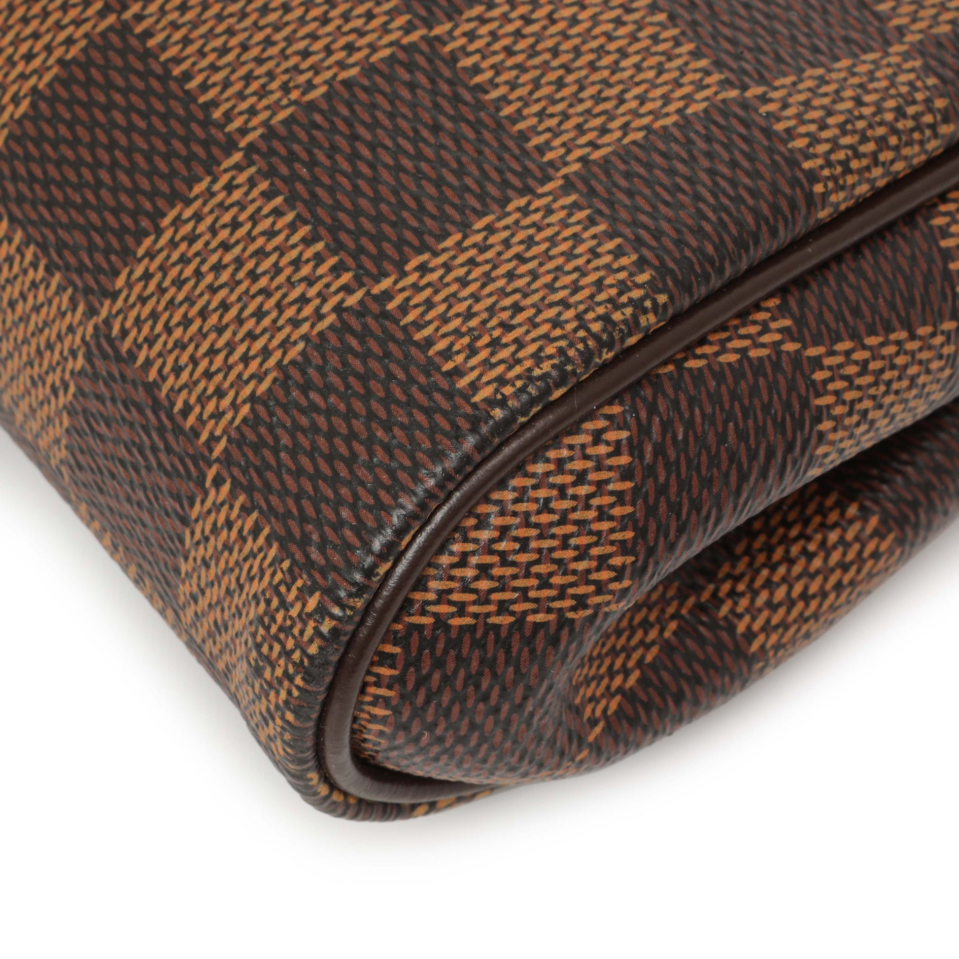 Exclusive Louis Vuitton Damier Ebene Eva Clutch — Lifestyle View