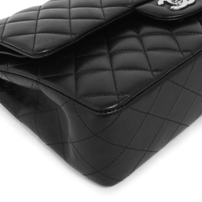 Exclusive Chanel  Black  Quilted  Lambskin  Medium Classic Double Flap — Lifestyle View