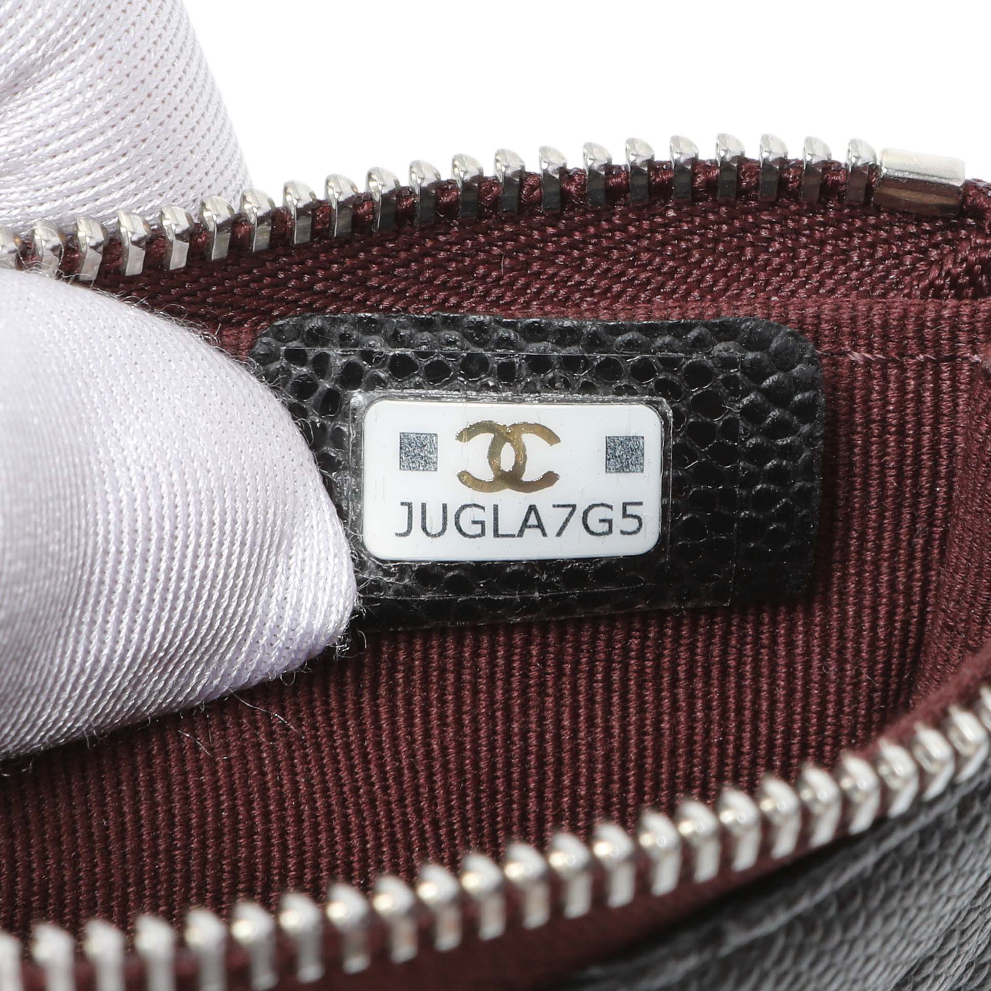 Exclusive Chanel Black Quilted Caviar Small Zipped Pouch — Lifestyle View