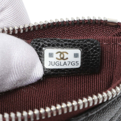 Exclusive Chanel Black Quilted Caviar Small Zipped Pouch — Lifestyle View