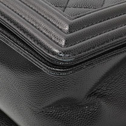 Exclusive Chanel Black Quilted Caviar Medium Boy Flap — Lifestyle View