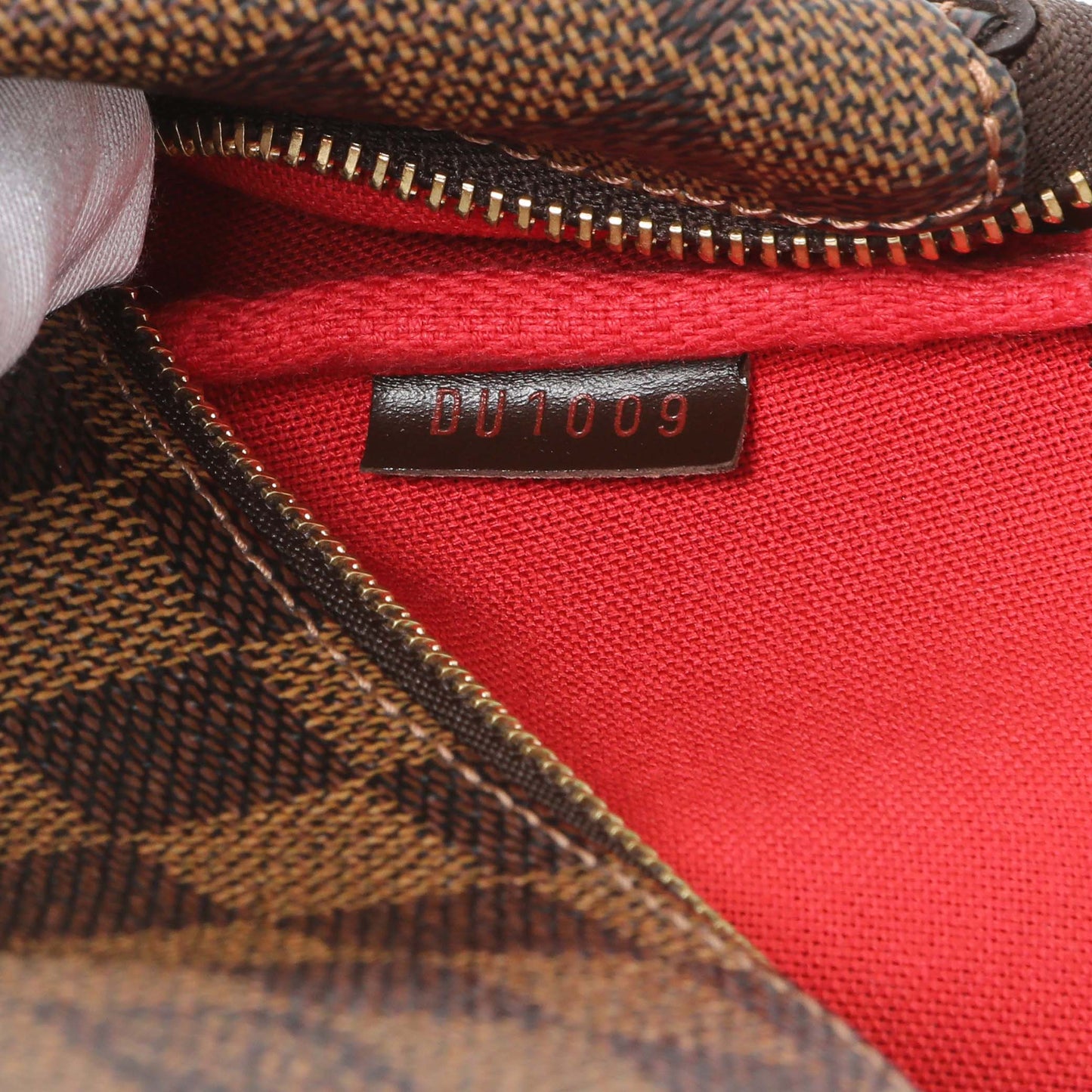 Exclusive Louis Vuitton Damier Ebene Eva Clutch — Lifestyle View