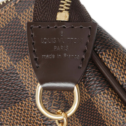 Exclusive Louis Vuitton Damier Ebene Eva Clutch — Detail View