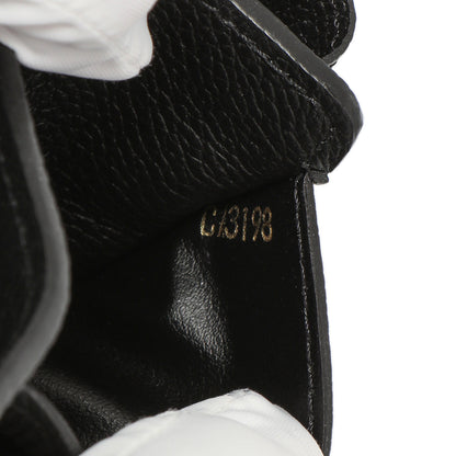 Exclusive Louis Vuitton Black Empreinte Metis Wallet — Lifestyle View