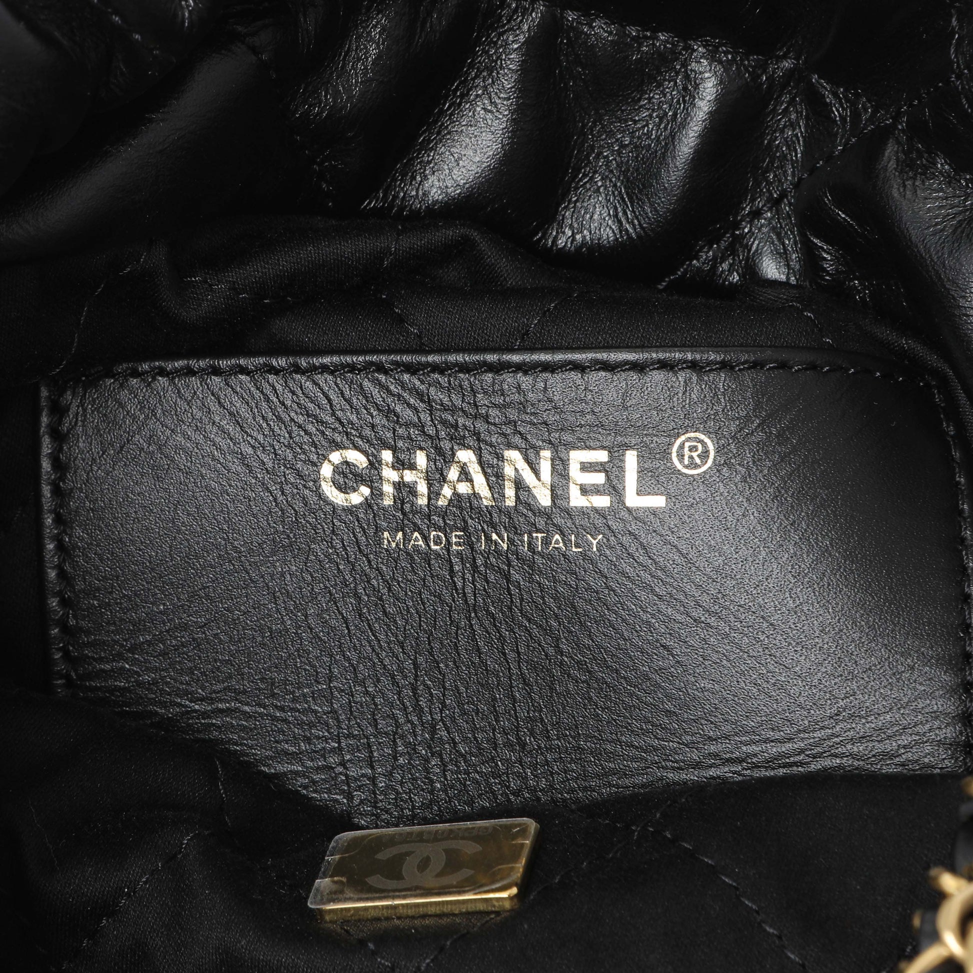 Exclusive Chanel Black Shiny Calfskin Quilted Mini Chanel 22 — Detail View