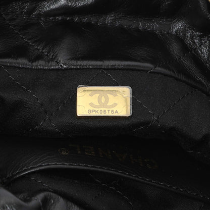 Exclusive Chanel Black Shiny Calfskin Quilted Mini Chanel 22 — Lifestyle View