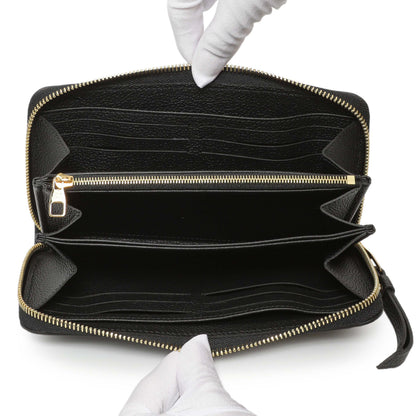 Exclusive Louis Vuitton Black Empreinte Zippy Wallet — Lifestyle View