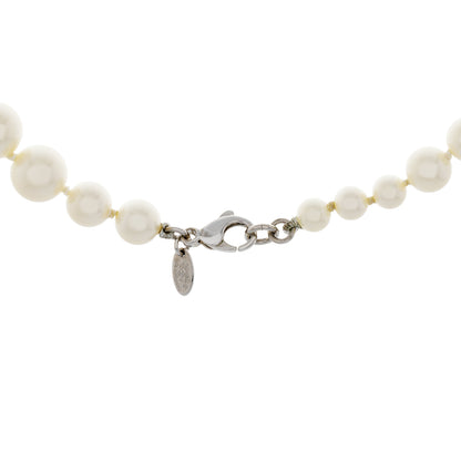 Exclusive Chanel CC Pearl Necklace — Side View