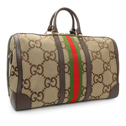 Exclusive Gucci Monogram Jumbo GG Textured Dollar Calfskin Web Large Duffle Bag — Side View