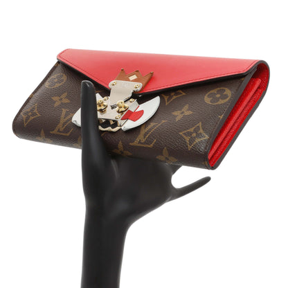 Exclusive Louis Vuitton Monogram Tribal Mask Sarah Wallet — Lifestyle View
