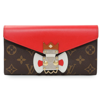 Exclusive Louis Vuitton Monogram Tribal Mask Sarah Wallet — Front View