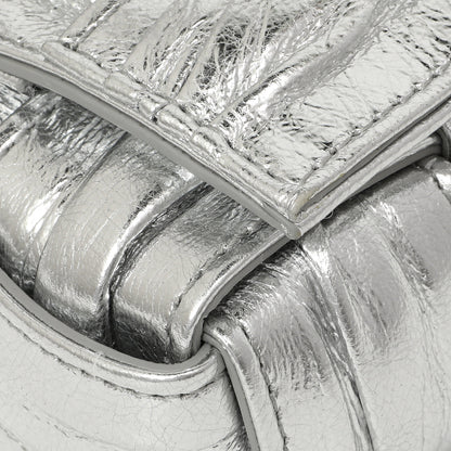 Exclusive Bottega Veneta Metallic Silver Calfskin Intreccio Plisse Small Cassette Crossbody Bag — Lifestyle View