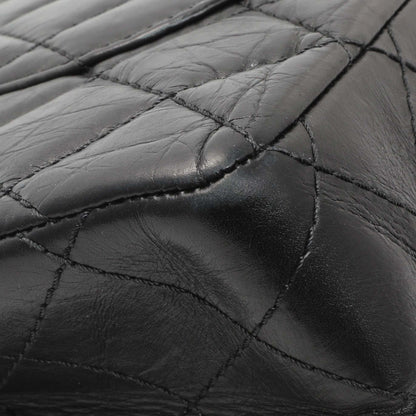 Exclusive Chanel Black Quilted Aged Calfskin 2.55 Reissue 226 Flap — Lifestyle View