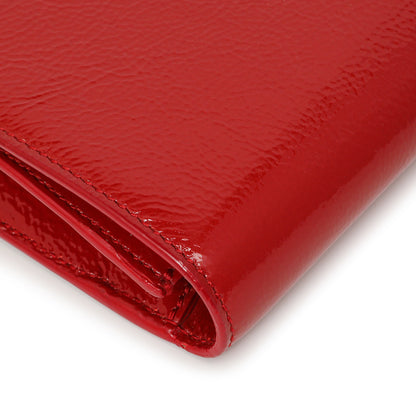 Exclusive Saint Laurent Red Textured Patent Monogram Large Belle De Jour Clutch — Lifestyle View