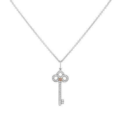 Exclusive Tiffany & Co. Platinum 18K Rose Gold Pink Diamond Mini Fleur de Lis Key — Front View