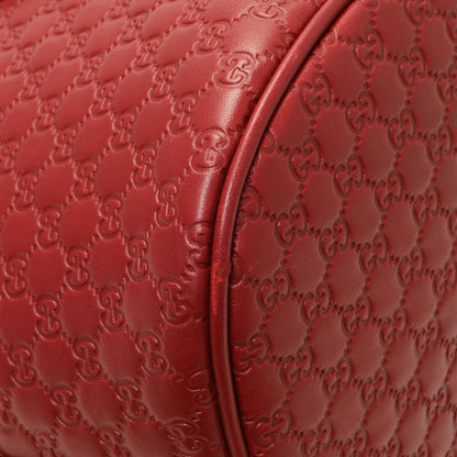 Exclusive Gucci Burgundy Soft Microguccissima Medium Dome Bag — Lifestyle View