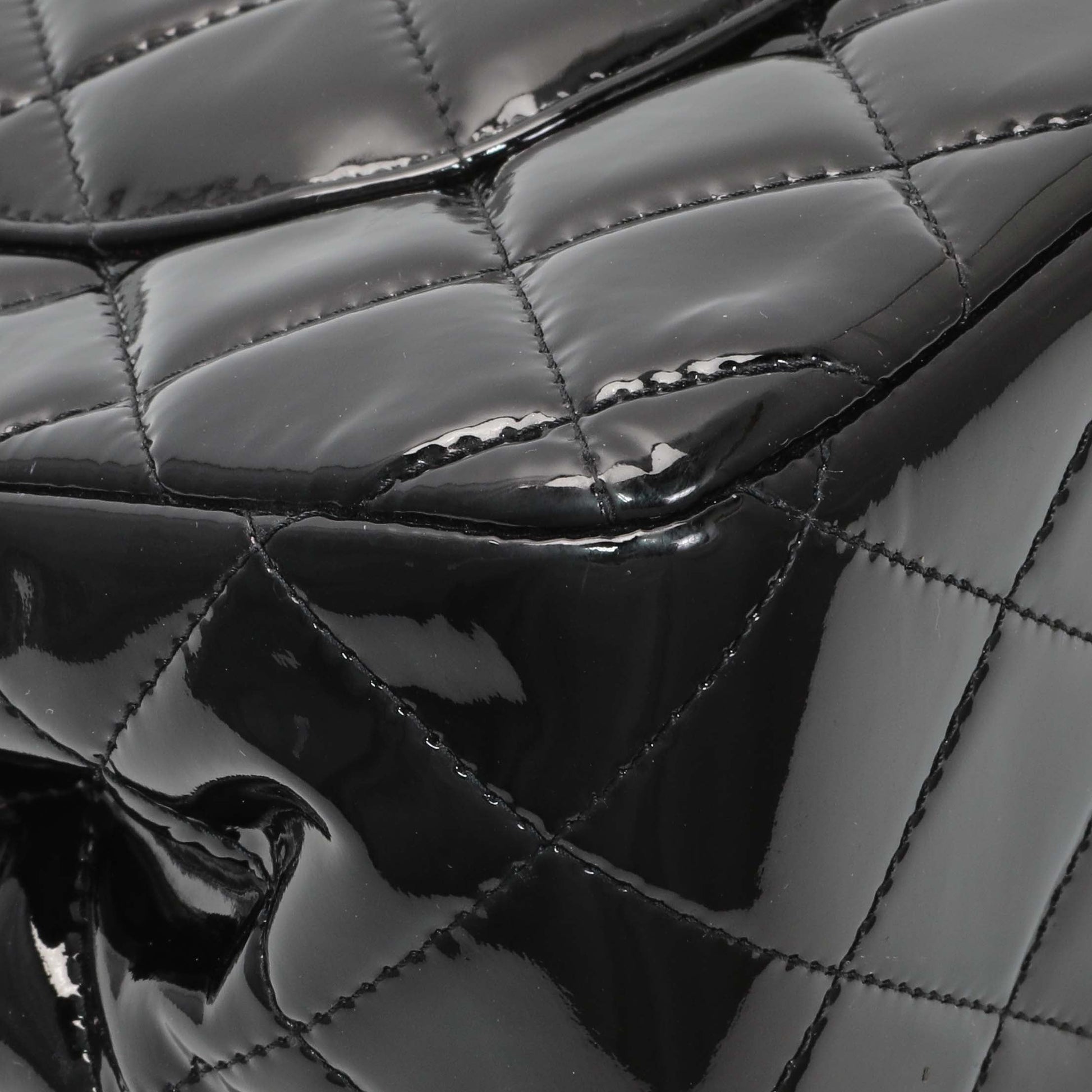 Exclusive Chanel Black Quilted Patent Jumbo Double Flap — Lifestyle View
