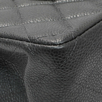 Exclusive Chanel Dark Grey Caviar Medium Classic Double Flap — Lifestyle View