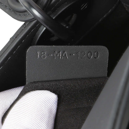 Exclusive Christian Dior Black Ultra Matte Calfskin Cannage Mini Lady Dior — Lifestyle View