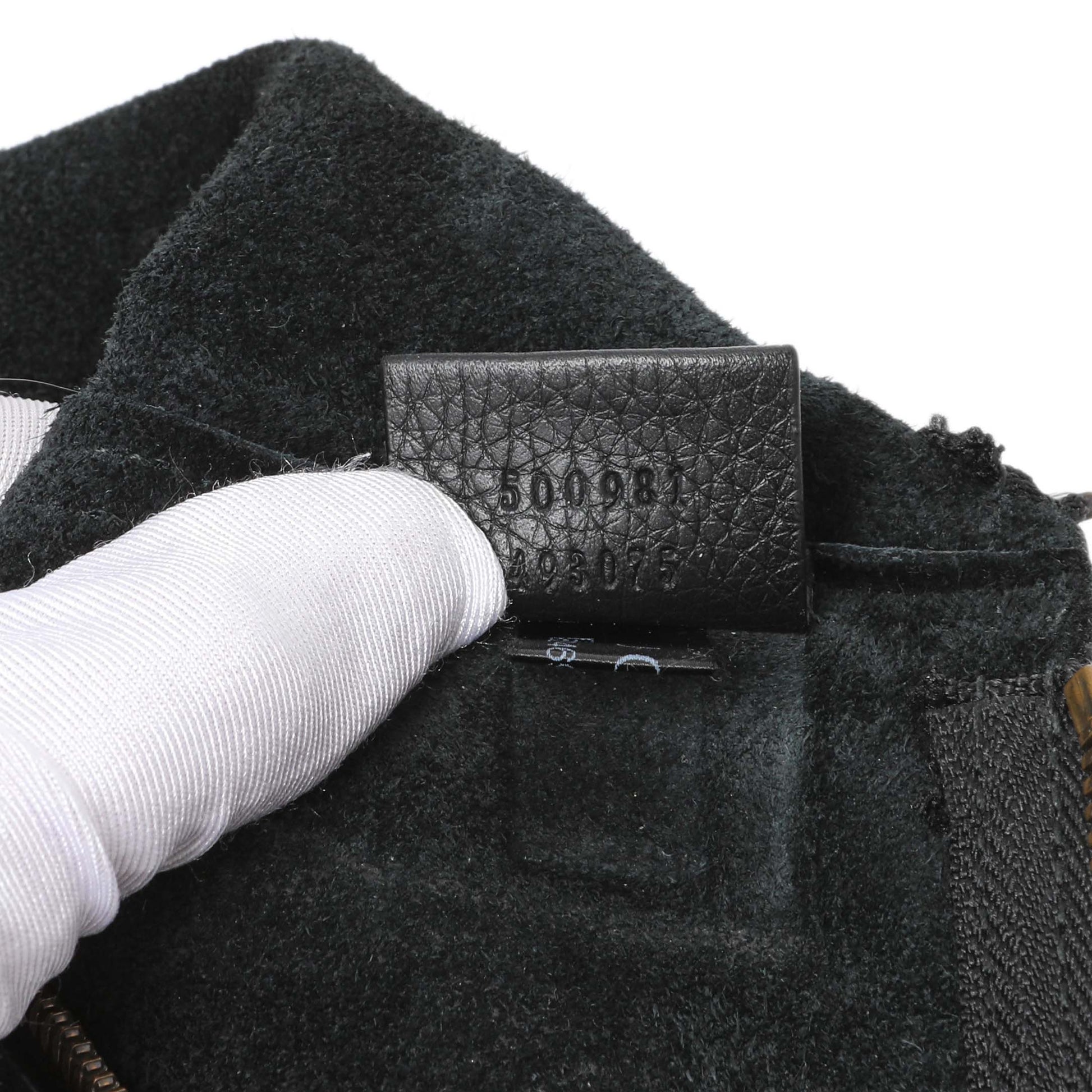 Exclusive Gucci Logo Print Leather Pouch — Lifestyle View