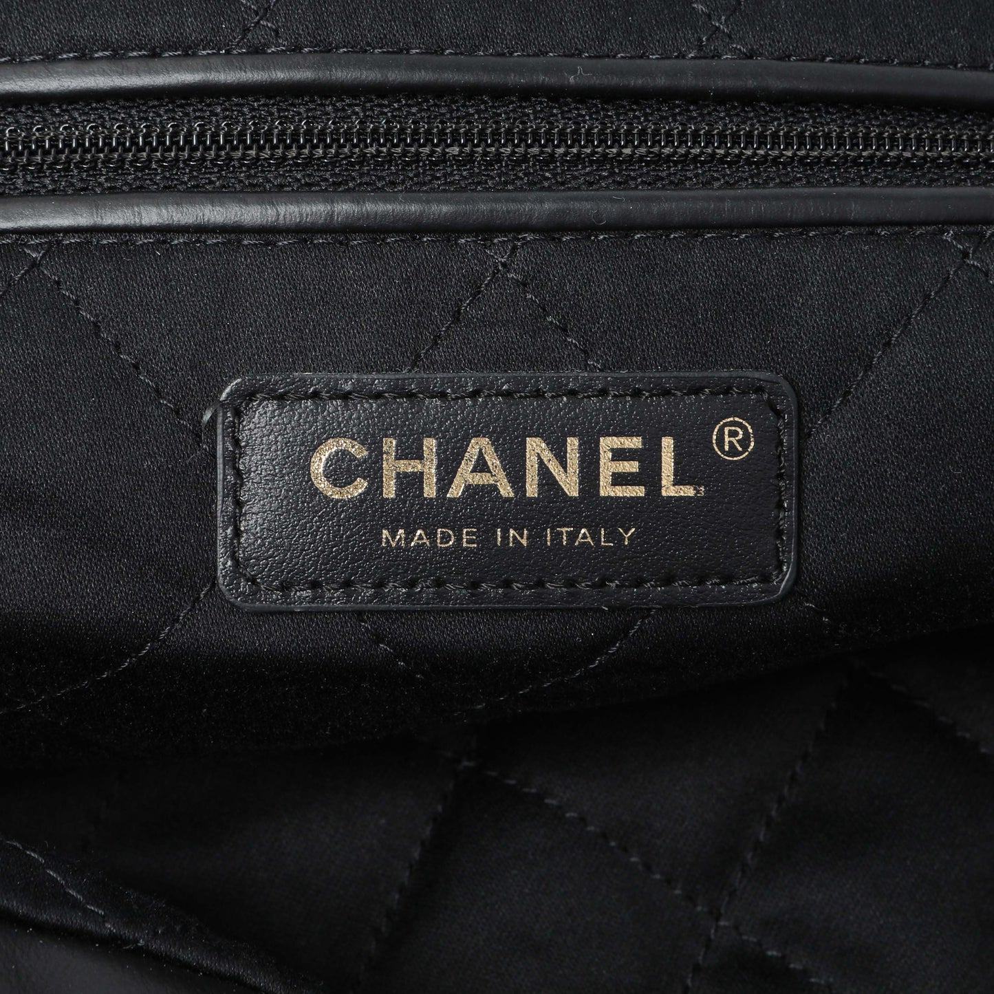 Exclusive Chanel Black Quilted Shiny Calfskin Large Chanel 22 — Detail View