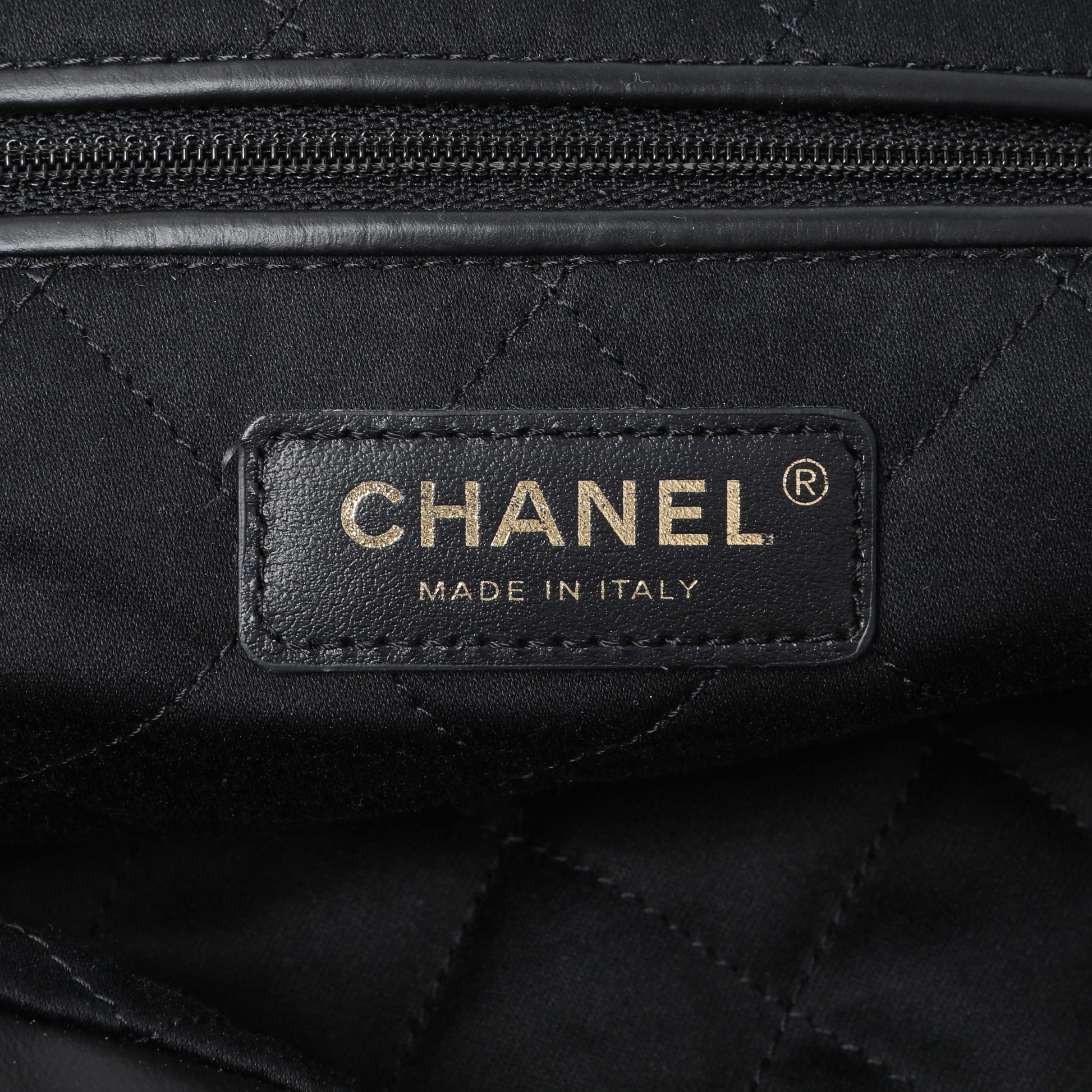 Exclusive Chanel Black Quilted Shiny Calfskin Large Chanel 22 — Detail View
