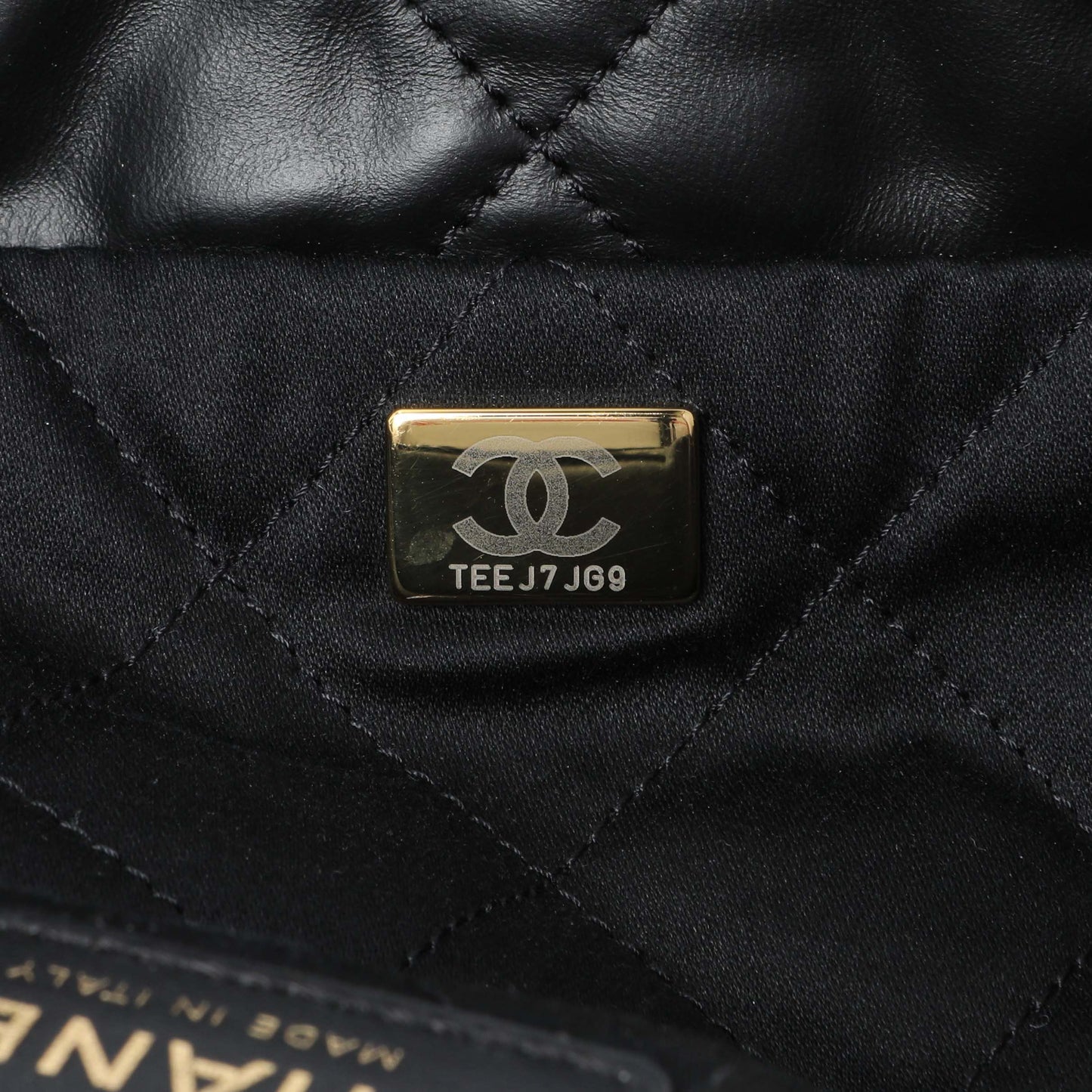 Exclusive Chanel Black Quilted Shiny Calfskin Large Chanel 22 — Lifestyle View