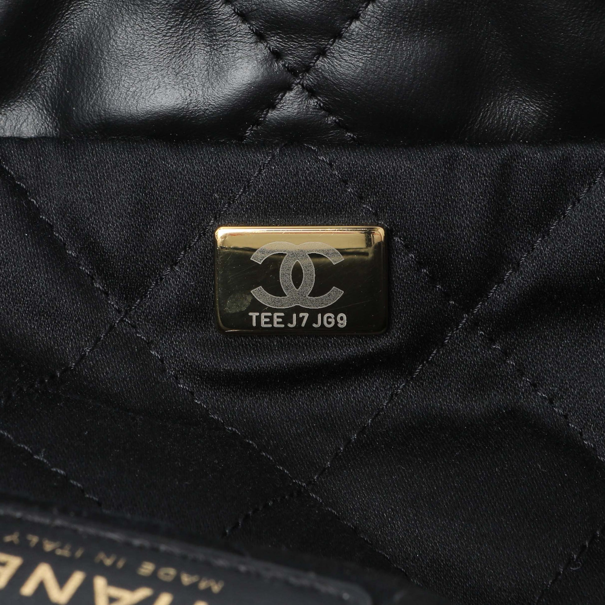 Exclusive Chanel Black Quilted Shiny Calfskin Large Chanel 22 — Lifestyle View