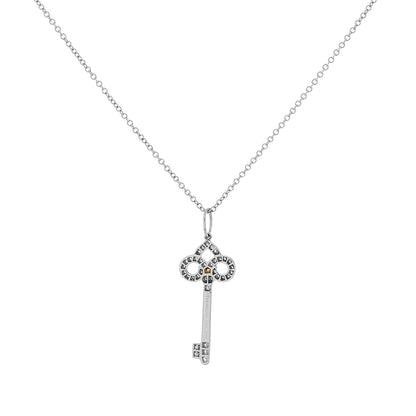 Exclusive Tiffany & Co. Platinum 18K Rose Gold Pink Diamond Mini Fleur de Lis Key — Side View