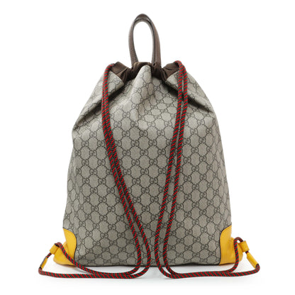 Exclusive Gucci GG Supreme Neo Vintage Drawstring Backpack — Side View